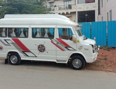 What is the seating capacity of a Tempo Traveller for hire or rent in Bangalore?