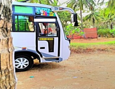 What is the seating capacity of the 18 Seater Tempo Traveller for Hire Majestic?